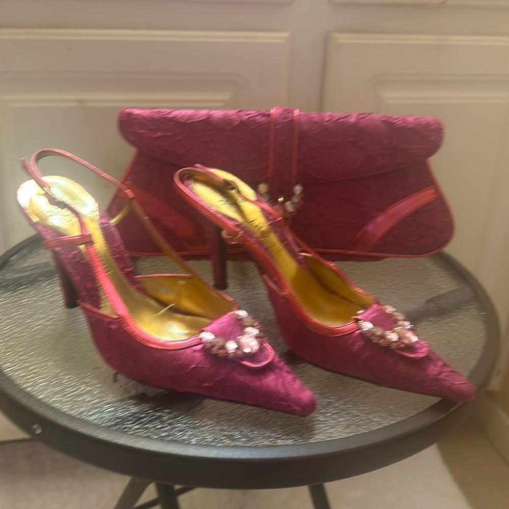 Fuchsia clutch and sling back heels.